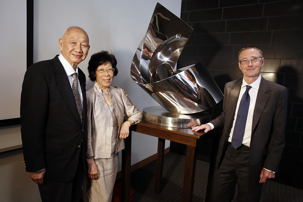 From left, philanthropists Kin-Chung and Amy Choi with Andy McMahon, director of the Eli and Edythe Broad Center for Regenerative Medicine and Stem Cell Research at USC (Photo by Steve Cohn)