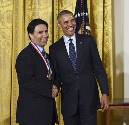 Mark Humayun, MD, PhD, shakes hands with President Barack Obama after receiving the National Medal of Technology and Innovation during a ceremony May 19, 2016, at the White House.