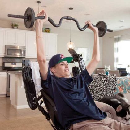 A car accident left Kris Boesen paralyzed. Experimental stem cell surgery gave him a chance to regain mobility in his arms and hands. (Photo by Greg Iger)
