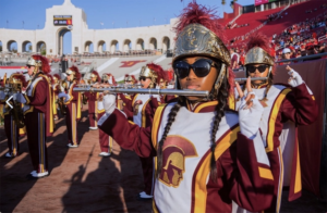 Tiffany Mays playing the flute in the Trojan Marching Band (Photo by Benjamin Chua)