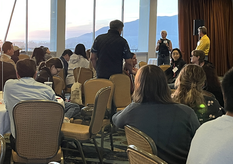 USC Stem Cell scientists watched the sun set over the Pacific Ocean during a Q&A with keynote speaker Aileen Anderson. (Photo by Cristy Lytal)